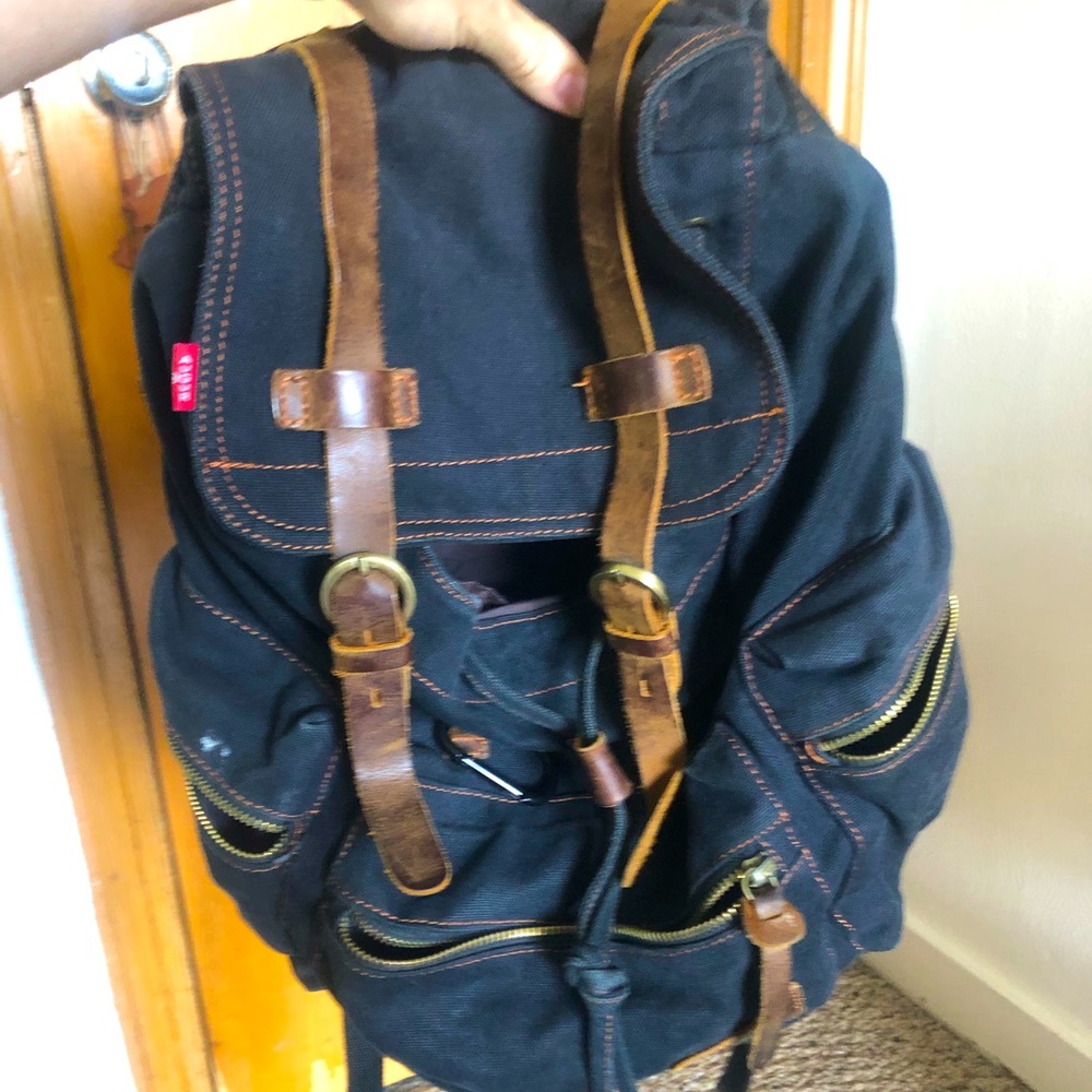 Sturdy Black and Leather College/School Backpack